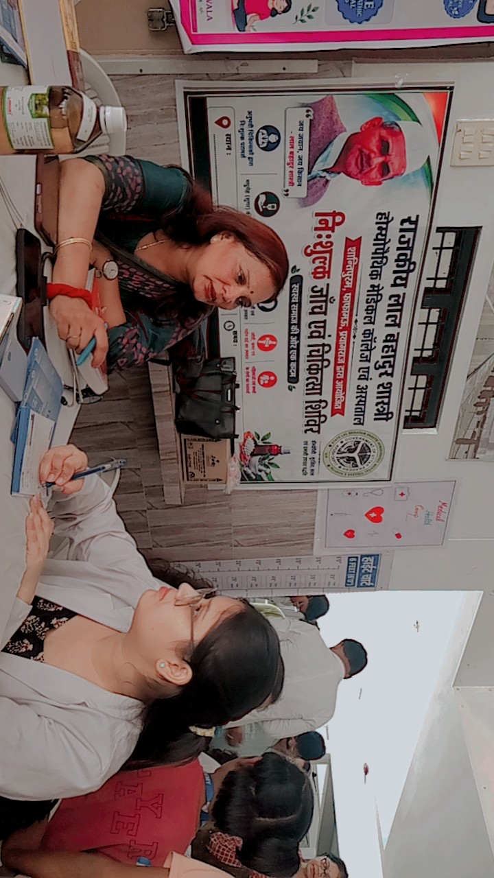 Dr. Geetika Agarwal in consultation with a patient at the medical camp